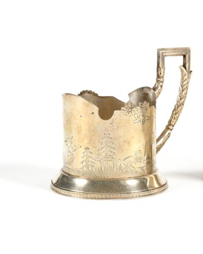 null Tea glass holder

Engraved silver

Marks: 2A (second artel), woman's head turned...