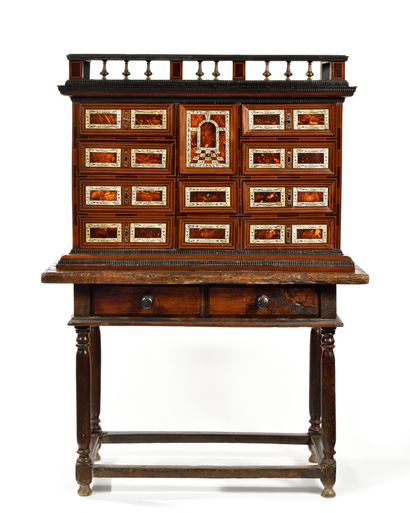 null WALNUT VENEER CABINET,
tortoiseshell and engraved bone, opening with eleven...
