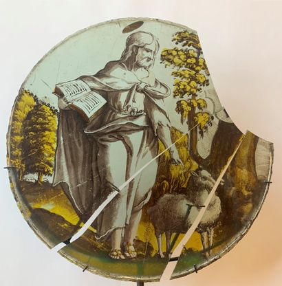 null ROUNDEL IN GRISAILLE AND SILVER YELLOW
representing Saint John the Baptist holding...