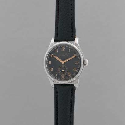 null ETERNA
Unitary type.
About :1940.
Steel bracelet watch. Round case. Black dial...