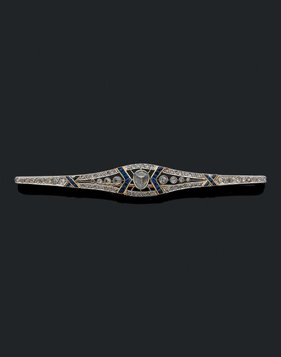 null BROCHE 

holding in its center a rose-cut diamond in a geometrical design paved...