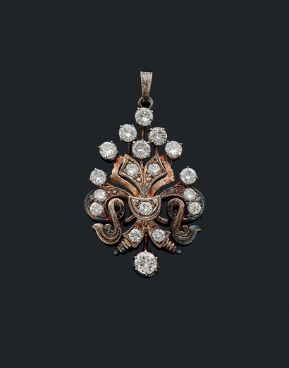 null PENDANTS

holding a plant motif punctuated with brilliant-cut diamonds. Mounted...