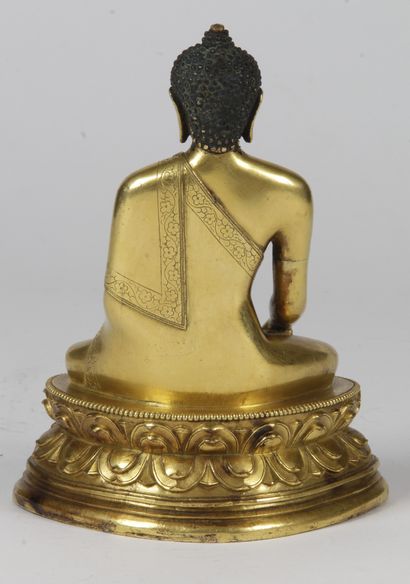 null Chine, XXe siècle_x000D__x000D_

Sujet en bronze doré, représentant le Bouddha...