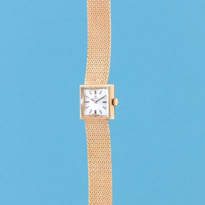 null OMEGA 
Circa: 1960. 
Lady's watch in yellow gold 750/1000. Square case. Gold...