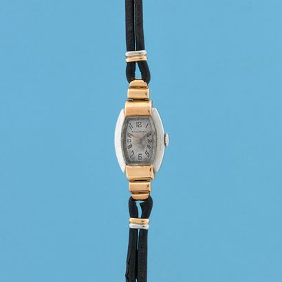 null BOUCHERON 
About 1930.
Bracelet watch in white and yellow gold 750/1000. Case...