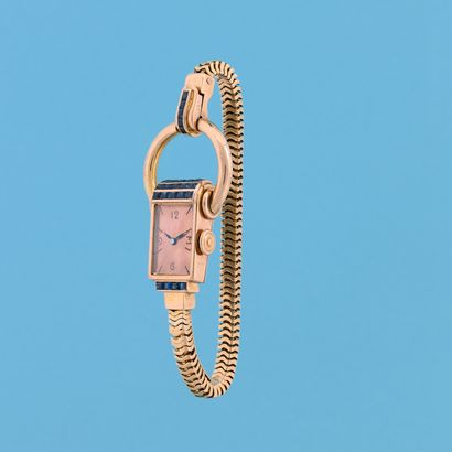 null HERMES by UNIVERSAL GENEVA
Padlock.
Circa 1940.
Ladies' watch in pink gold 750/1000....