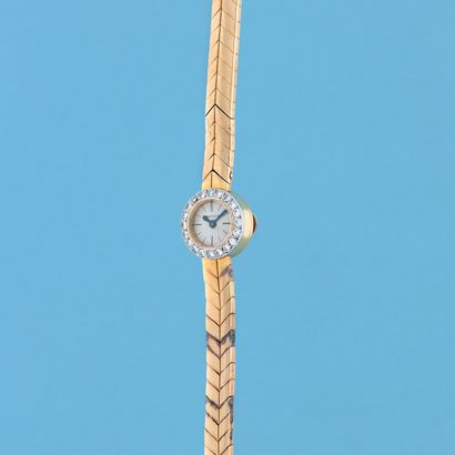 null CARTIER
Ref:015415
Circa 1950.
Ladies' wristwatch in yellow gold 750/1000, round...
