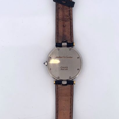 null CARTIER



Santos round.



Circa: 1980.



Steel and gold bracelet watch. Round...