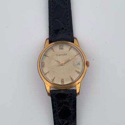 null GIGANDET



Circa: 1960. 



Yellow gold plated wristwatch. White dial signed....
