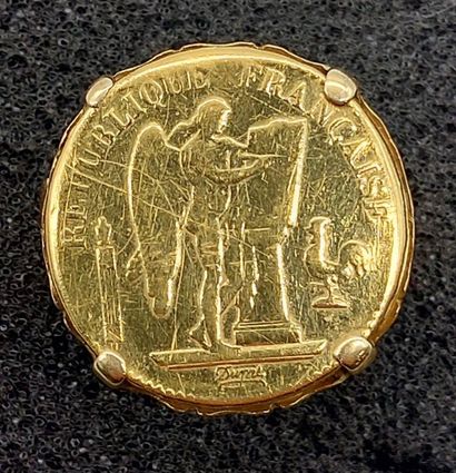 null BAGUE retenant une pièce en or de 20 francs 1886

Monture en or 

PB : 11.2...
