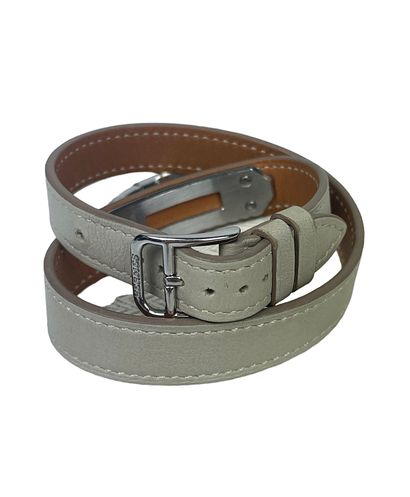 null HERMES
Kelly" wrist watch in turtle leather and silver plated metal
Very good...