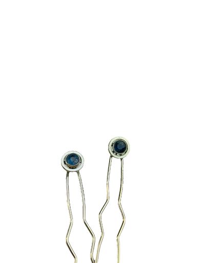 null TWO blue stone and white enamel HAIR PINS. Original case. 
Gross weight : 4.12...