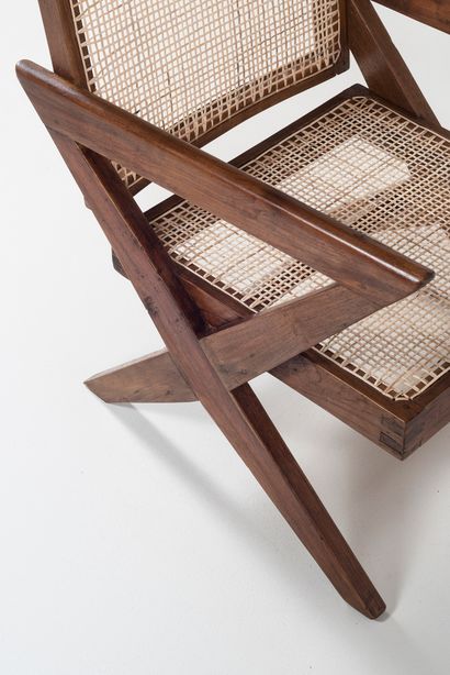 null PIERRE JEANNERET (1896-1967)

PJ SI 45 A

"Cross easy Chair", circa 1956

Pair...