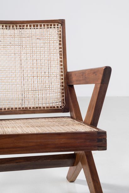 null PIERRE JEANNERET (1896-1967)

PJ SI 45 A

"Cross easy Chair", circa 1956

Pair...