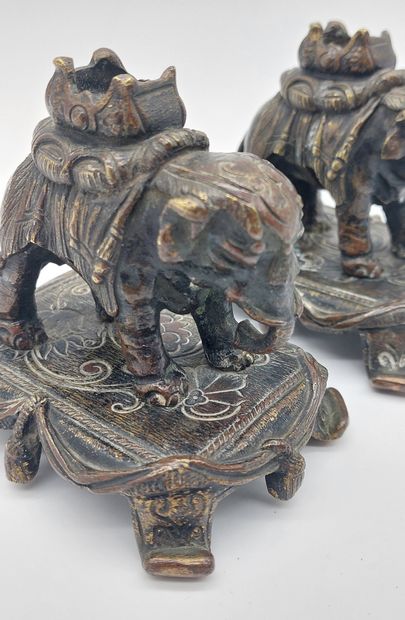 null PAIR OF CANDLES representing elephants in bronze __
Monogrammed under the base:...