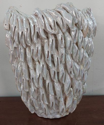 Ceramic vase of pearly color with decoration...