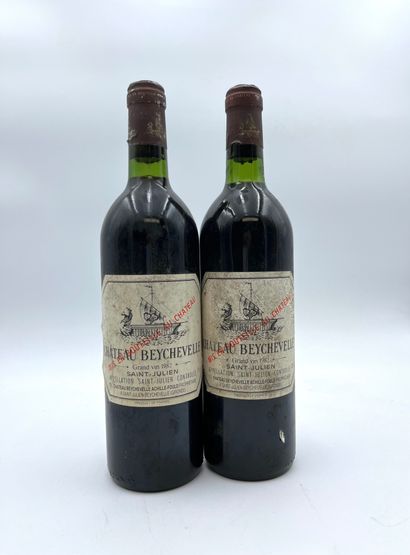 null 2 bottles CHÂTEAU BEYCHEVELLE 1982 4th GC Saint-Julien
(E. a, tm, C. traces...