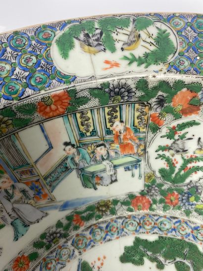 null CHINA 
Polychrome porcelain basin with green family enamel decoration of characters...