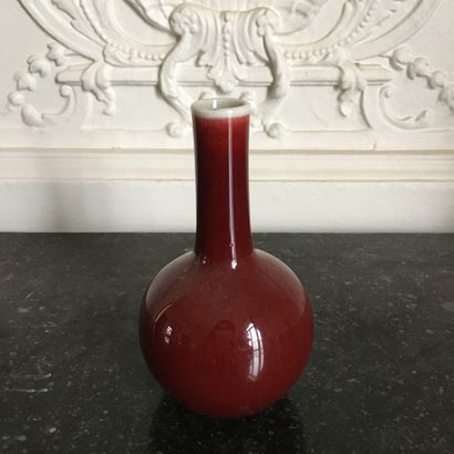 null CHINA 
Collection of six oxblood red porcelain baluster vases 
19th - 20th century...