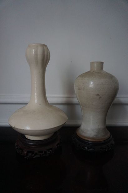 CHINA 
Two glazed earthenware vases 
H :...