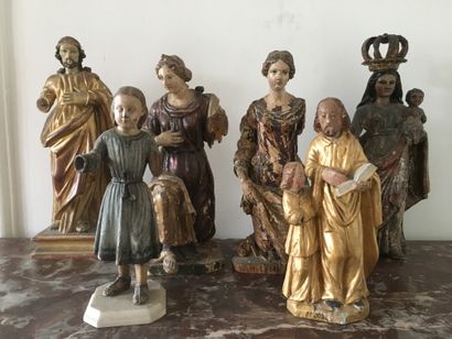 COLLECTION OF STATUETTES in carved and polychromed...