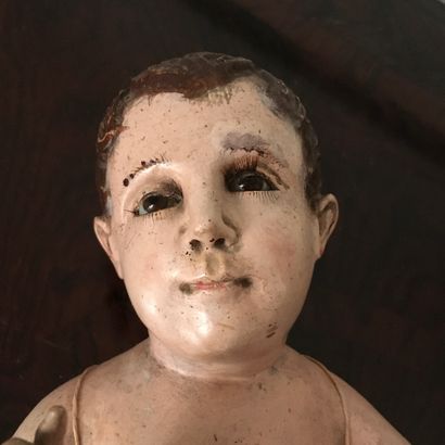 null SANTON in wood painted in the natural, the eyes in sulfur representing the Child...