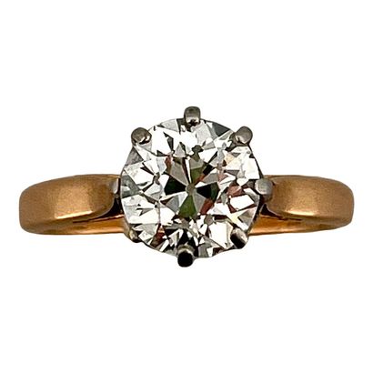 null SOLITARY 
holding an old cut diamond of 1.47 carat approximately. 18K gold and...