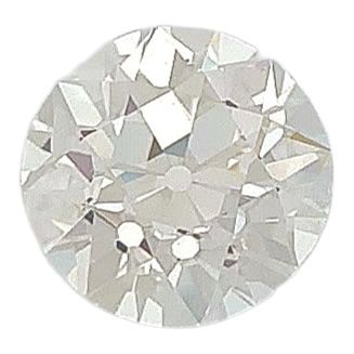 null SOLITARY 
holding an old cut diamond of 3.33 carats approximately. Platinum...