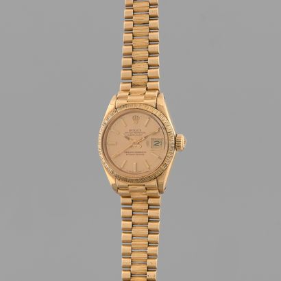 null ROLEX
Datejust.
Ref: 6927.
Circa: 1973.
Ladies' wristwatch in yellow gold 750/1000....