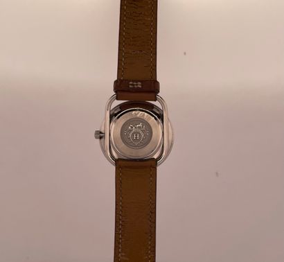 null HERMES
Arceau. 
About 2010. 
Stainless steel wristwatch, round case, white dial...