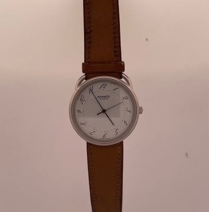 null HERMES
Arceau. 
About 2010. 
Stainless steel wristwatch, round case, white dial...