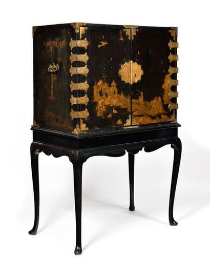 LACQUER CABINET 
on its black and gold base...