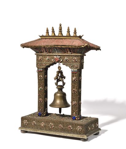 null PORTICO FOR HANGING A BELL,
in the form of a temple door, in copper with filigree...