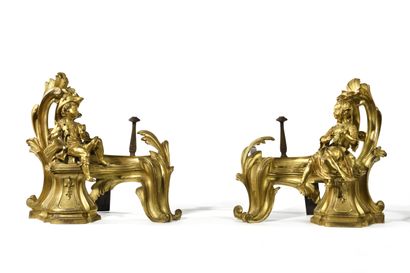 null PAIR OF ANDIRONS
in gilt bronze decorated with young children musicians and...