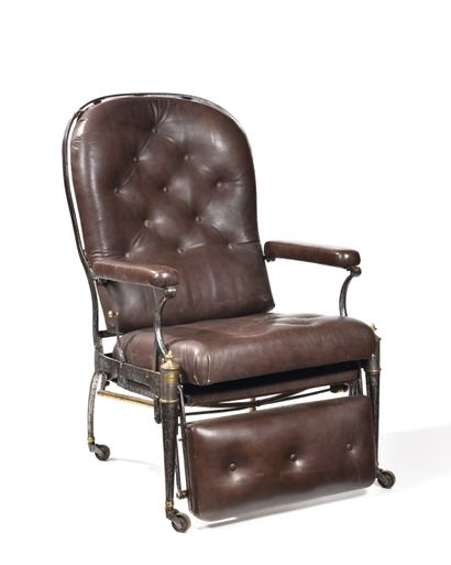 null ARMCHAIR WITH MECHANISM IN METAL COVERED WITH LEATHER. 
It rests on four feet...