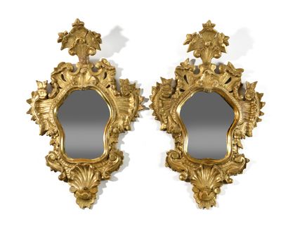null PAIR OF MIRRORS in carved and gilded wood. 
Decorations carved into the wood.
Dimensions:...