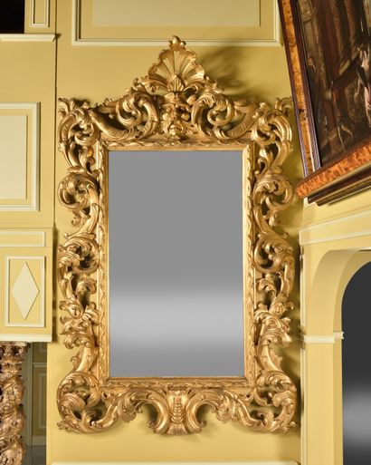 LARGE giltwood MIRROR with openwork decoration...