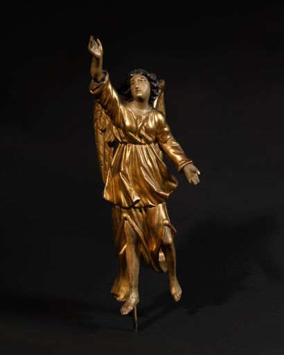 null SUITE OF FOUR ANGELS
in carved, polychromed and gilded wood. Standing, they...