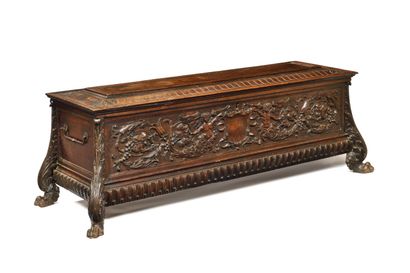 CARVED WALNUT CHEST,
top opening, decorated...
