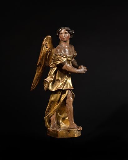 null SUITE OF FOUR ANGELS
in carved, polychromed and gilded wood. Standing, they...
