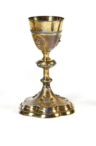 Gilded silver CALICE decorated with the instruments...