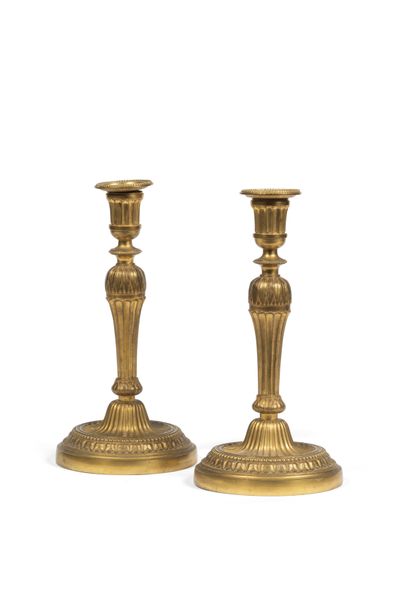 PAIR OF GILDED BRONZE TORCHES,
the fluted...