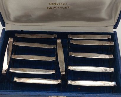 null BOULENGER

Twelve knife holders in silver plated metal