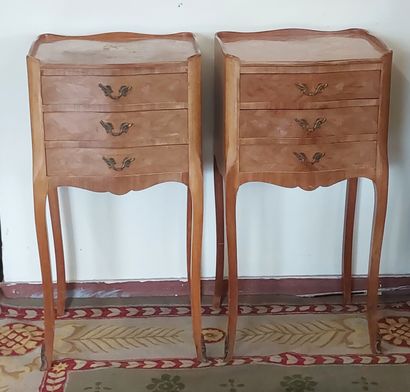 null PAIR OF CHEVETS in wood veneer, three drawers, top with floral decoration

Louis...