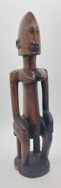 null AFRICAN STATUTE in wood 

H : 59 cm

(missing base)
