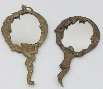null TWO FACE-TO-FACE MIRRORS

In bronze decorated with harlequins and moons

H :...