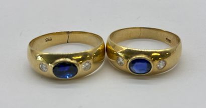 ENSEMBLE 

of two rings holding an oval sapphire...