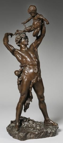 null GROUPE EN BRONZE a patine brune figurant un homme et un jeune faune. Signé Léopold...