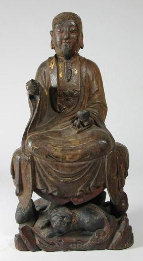 CHINE BOUDHA en bois sculpte anciennement peint polychrome. Periode Ming, XVIIe siecle...