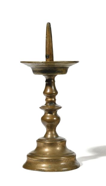 null SMALL BRONZE CANDLESTICK.
The baluster shaft on circular base.
Work of the 17th...
